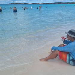 I got my toes in the water, a$$ in the sand, not a worry in the world, a cold beer in my hand....