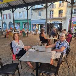 A wee rose in the town square last night
