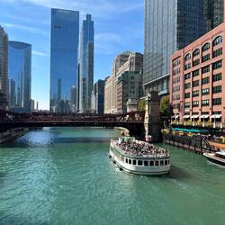 Looking west along the Chicago River. My hotel is low building to right between slim tower and Mart