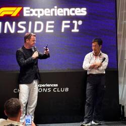 At the cocktail event, Q&A with the principal for the Haas team Ayao Komatsu