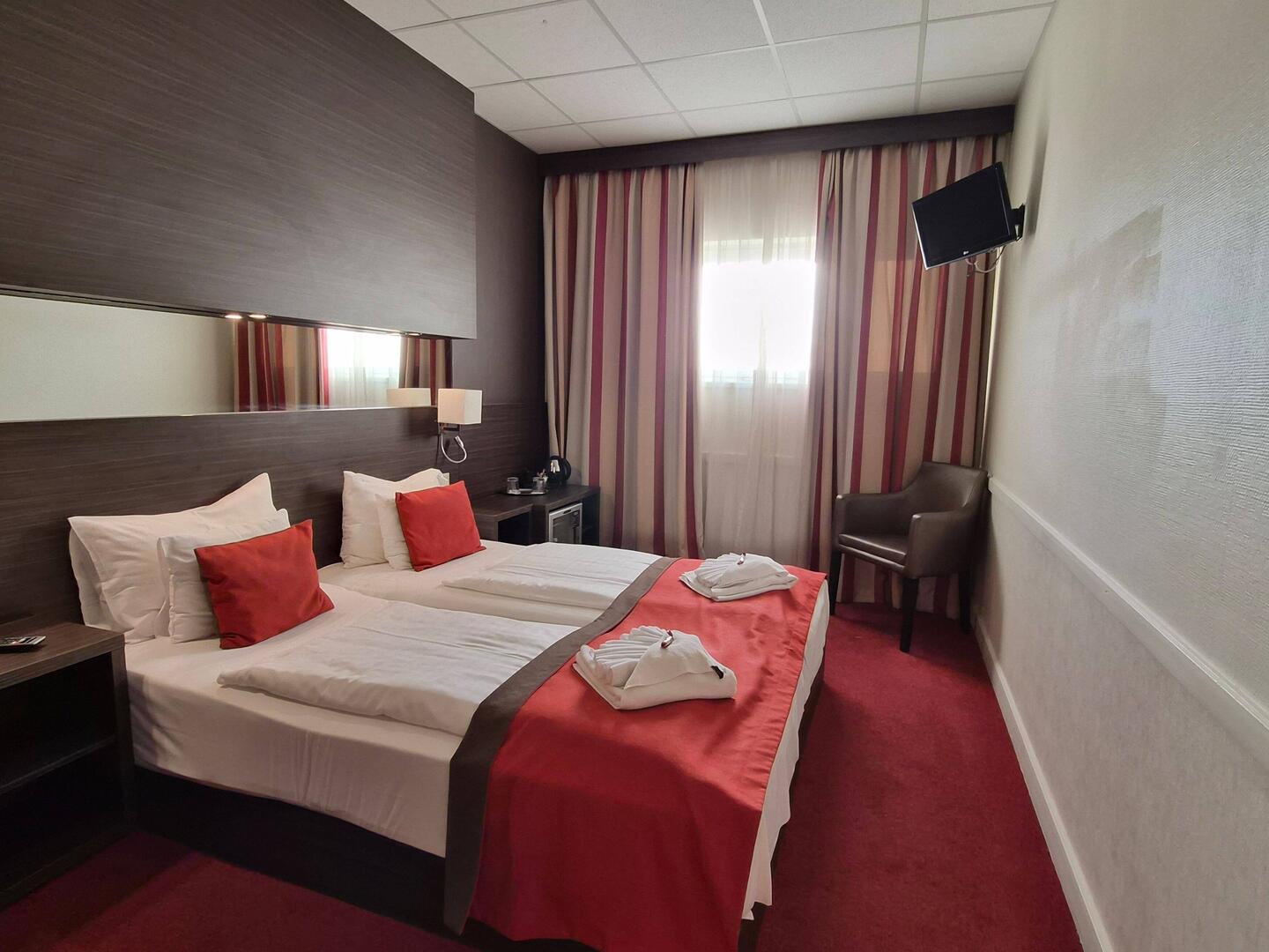 Mijn kamer in het City Inn Hotel.