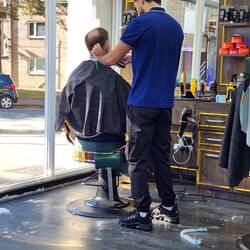 KG giving Chris his beard trim