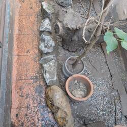 Putting the stones back in place but slightly higher