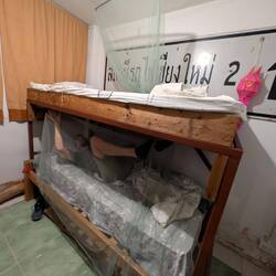 Installing the mosquito nets for our nights at the Workaway