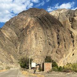 An immense surfing wave of stone...