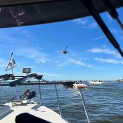 Even a helicopter was flying around. I always thought there was a 500' minimum over people...