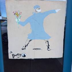 A mural by "Bunksy" at Pāʻia.