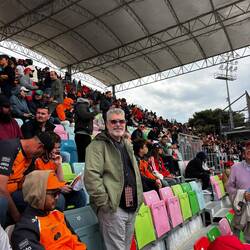 Smiling man in the stands