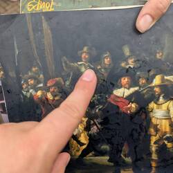 Rembrandt painted himself in the night watch hidden in the back.