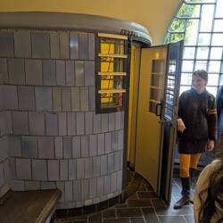 The double door phone booth as people often yelled