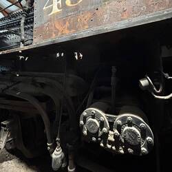 Fireman's 2-cylinder 'automatic' stoker engine located beneath the cab floor