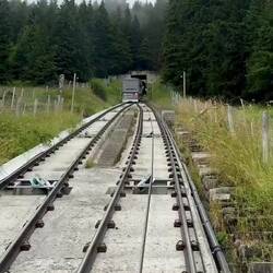 Crossing paths with the funicular that is heading down — Mürren, Switzerland.