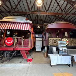 Two of the memorable passenger cars on display