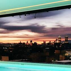 A fabulous sunset on the terrace of the Banyan Tree Puebla hotel.