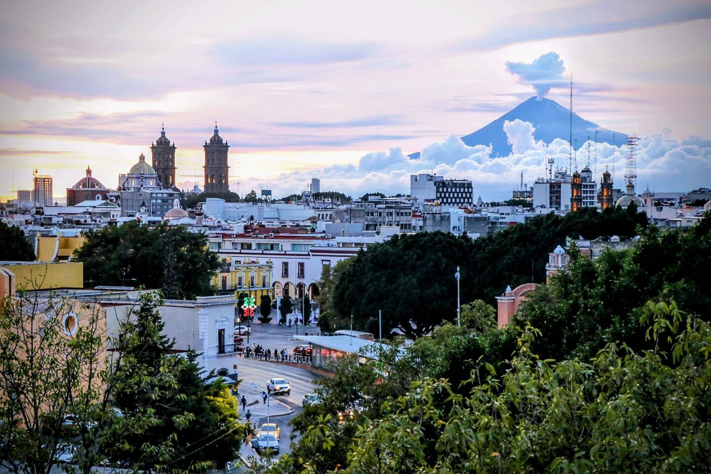 Picturesque sunset in Puebla, with the famous Popocatepetl in the background.