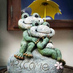 We are welcomed back from Allmendhubel by a pair of cute frogs — Mürren, Switzerland.