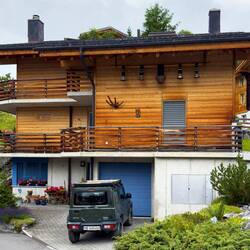 A modern chalet with typical Swiss bells — Mürren, Switzerland.