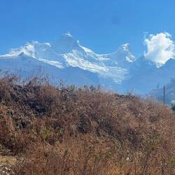From the road we start seeing white peaks on our left
