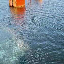 Starting the stern-in manoeuvre. Note engines in reverse sucking the water forward