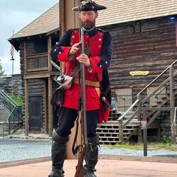 Replacing the ram rod after loading the Brown Bess
