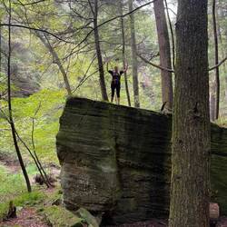 This rock was taller and harder to get up on than it appears, but they challenged me to do it and...
