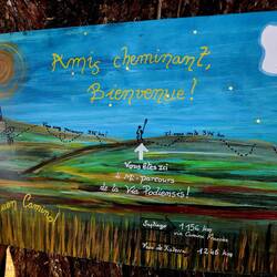 The sign on path telling us we have reached half way