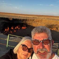 Squinting because of the sun.