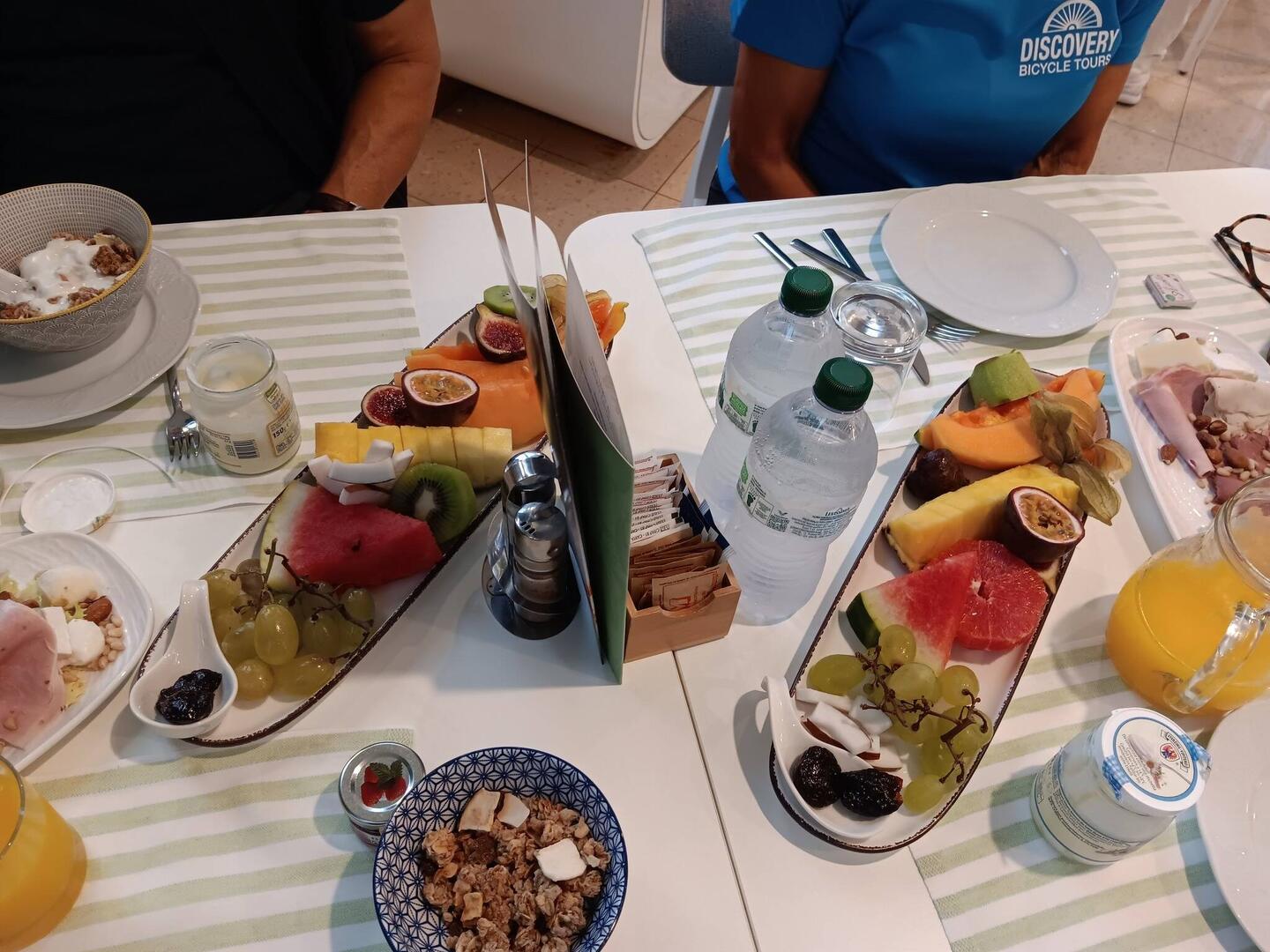 Sliced fruit for each table as part of breakfast offering