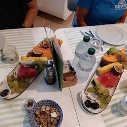 Sliced fruit for each table as part of breakfast offering