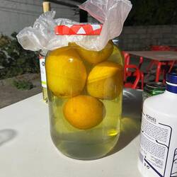 Some kind of homemade alcohol concoction made with oranges