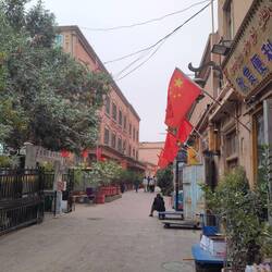 The beautiful old town was recently decorated with a lot of red flags