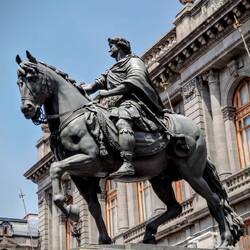 A colonial statue of Charles IV of Spain infront of National Museum of Art.