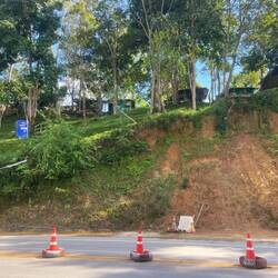 Top of the hill. Huts clinging to the slope