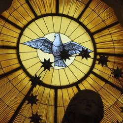 Stained glass above altar in Duomo