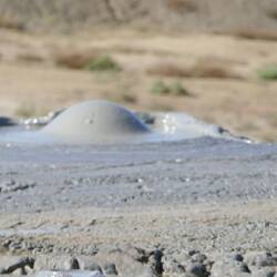 Cold bubbling mud caused by escaping gas