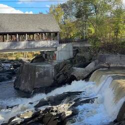 Ottauquechee River flowing under the Quechee  Covered Bridge