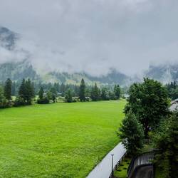 You can't see the rain in this photo, but you can see the low-lying clouds — Kandersteg, Switzerland