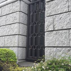 Japan Stock Exchange. X's in the window grates.