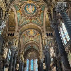 Looking towards the front. Great stained glass windows