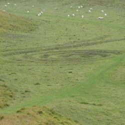 Things that make you go "hmmm" ... a swirling land sculpture titled 'Time and Flow'