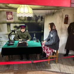 A display on Soviet interrogation of Wives of Traitors