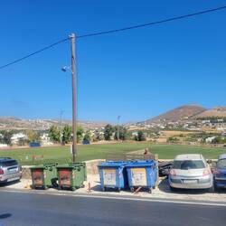 View from our hotel room. Football pitch was busy with players of all ages. Trash emptied early.