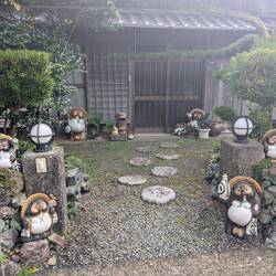 These little statues are at many many houses. I thought they might be bear pilgrims.