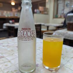 This glass bottle weighed about 300g. Note the tagline