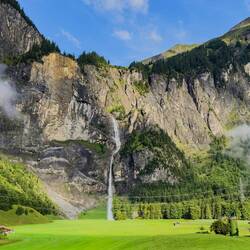 We enjoy lovely alpine views part of the way during our ride on the car train — Switzerland.