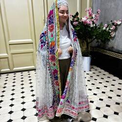 The mother's wedding outfit was there and one of our travel companions modelled it