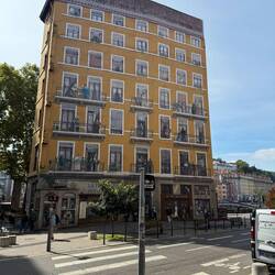 All these windows and shops are painted. The Lumiere brothers are bottom right balcony
