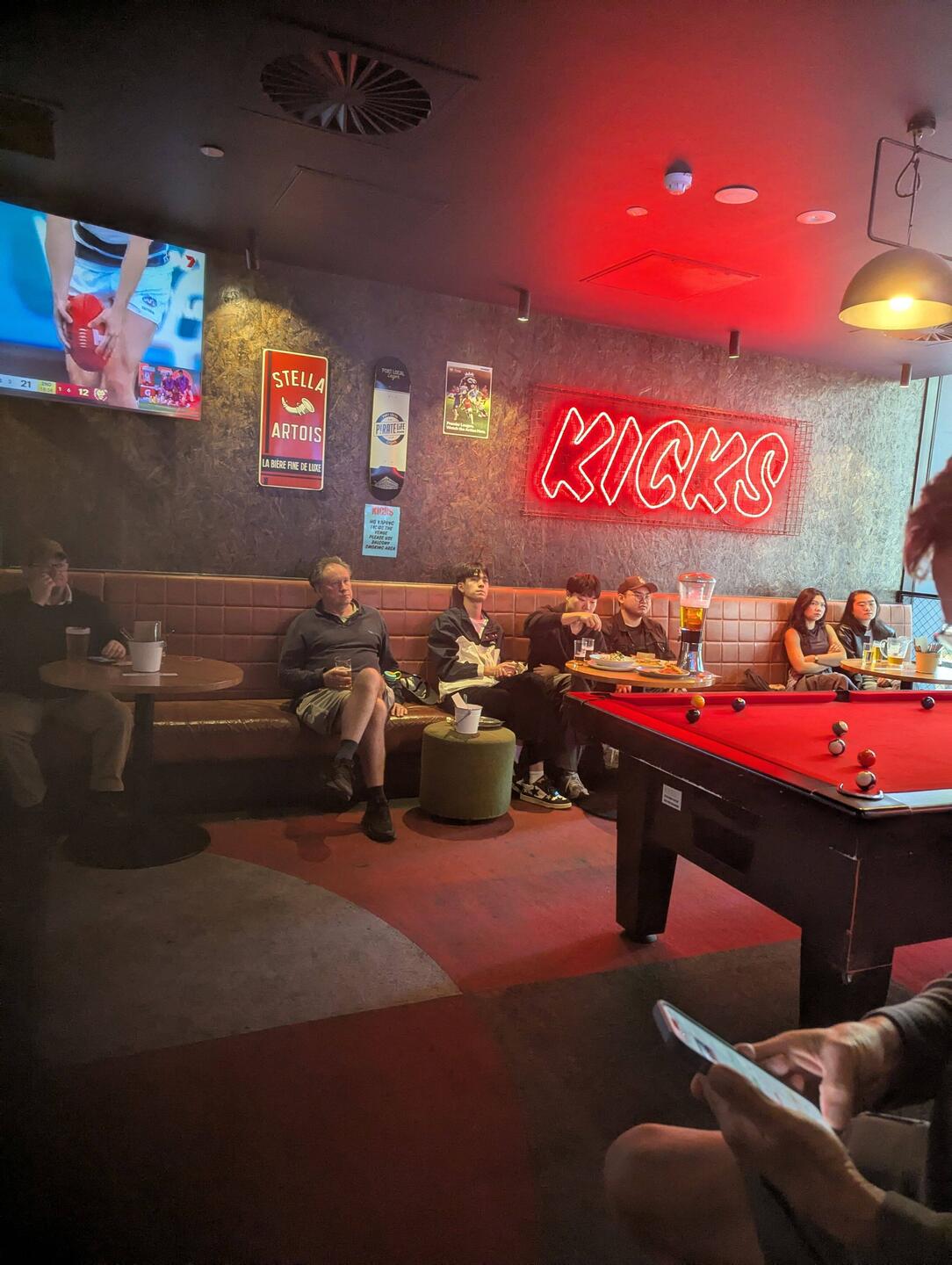 Catching the Australian Rules Football men's final match at Kicks Sports Bar, Melbourne