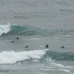 Surfers at Margaret River beach break