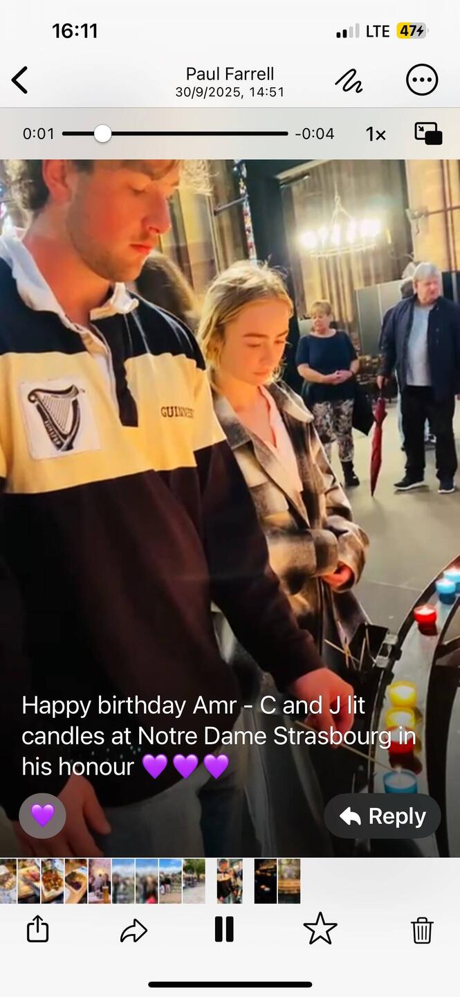 Charlie and Jaimee light candles for Amr in France